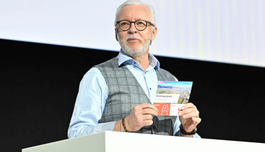 Moderator Georges Lüchinger.